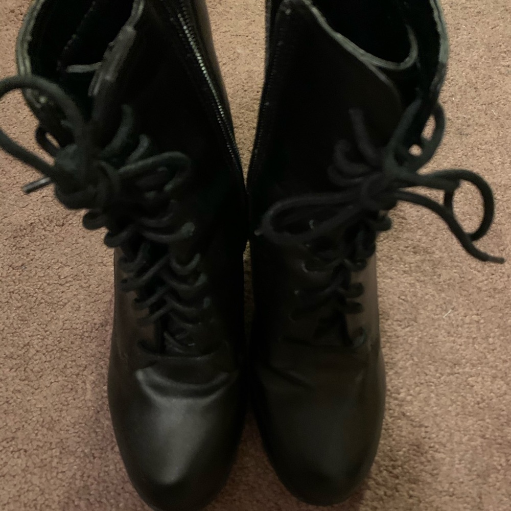 Black heeled booties.